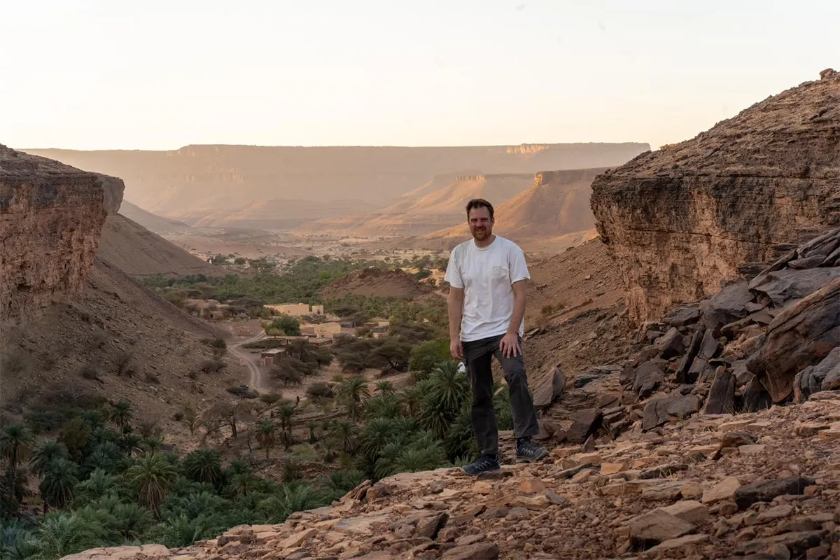 Wiebe Wakker at Terjit Oasis, Mauritania Wiebe Wakker with the Terjit Oasis behind him during sunset.